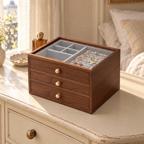Coffret à bijoux en noyer et laiton, couvercle verre, 3 niveaux et 2 tiroirs